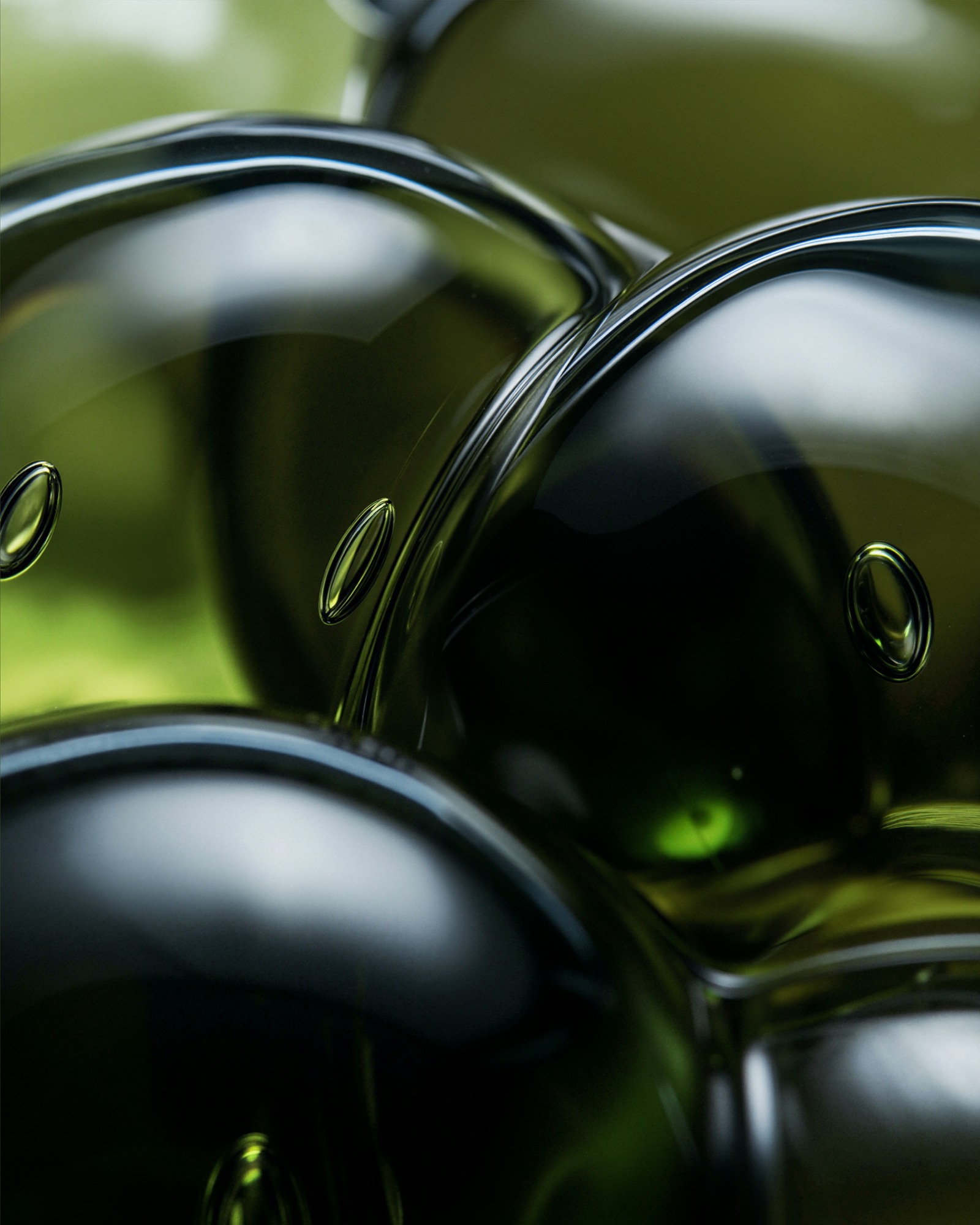 Liquid Light Engine — bubble logic: lens-like inclusions suspended within deep olive glass, carrying highlights through the mass
