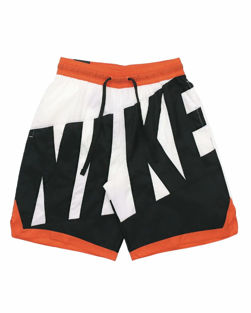 Reference — wardrobe: black, white and orange shorts with a large printed logo
