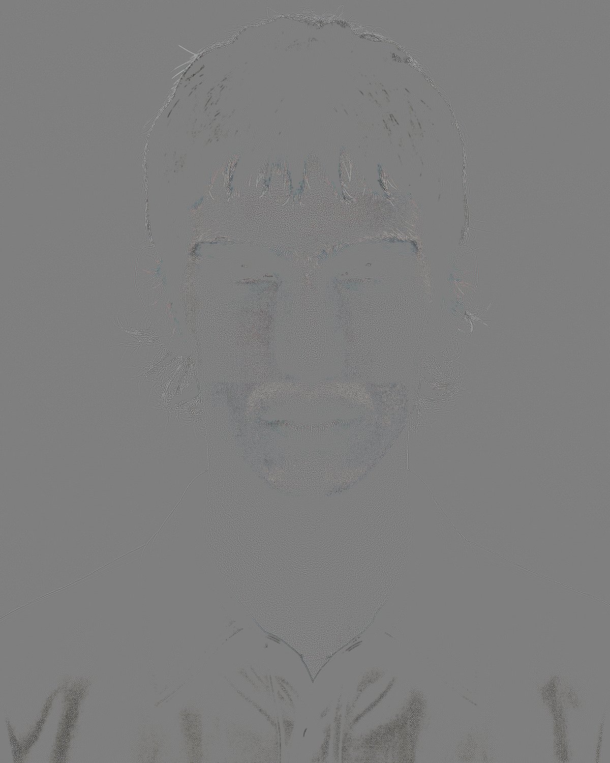 High-frequency difference for portrait 1 — the fine detail the model added